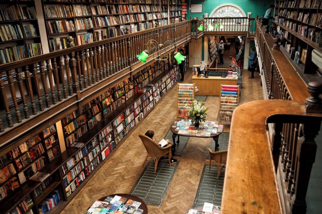 Daunt Books in Marylebone – an offbeat thing to do in London for curious travellers, showcasing a historic Edwardian bookstore with wooden balconies and travel books.